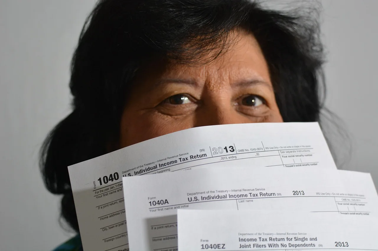 taxes, bills, 1040, woman, incomes, tax, fees, taxes, taxes, taxes, taxes, taxes, tax, tax, tax, fees, fees, fees, fees, fees. Are Sales Tax Registration and Filing Fees Deductible on Schedule C?
