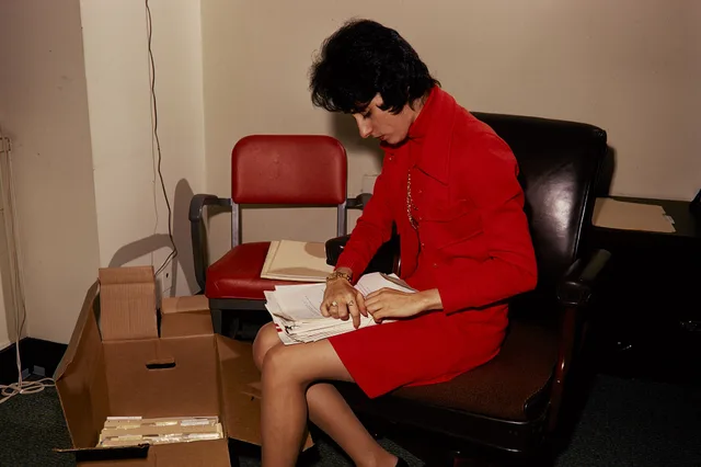 NPS employees looking through paperwork in the Womens Program in Washington Office. Keywords: nps staff; desk; NPS Personnel(NPS History Collection Themes); Women(NPS History Collection Themes); Communications(NPS History Collection Themes). Rate mechanics or registration judgment: what a sales tax service actually sells