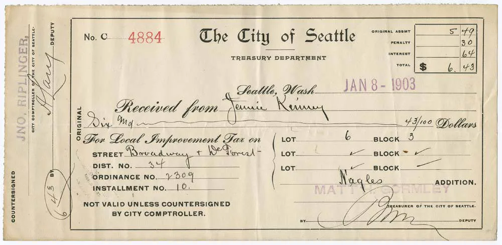 This January 8, 1903 receipt from the City of Seattle, Treasury Department was issued to a Jennie Kinney for a payment of $6.43. The fee was for the Local Improvement Tax, used to create roads, pavement, and sidewalks in Seattle. This payment was for Lot Six, Block Three, and the Street was Broadway. Tax recordkeeping checks: capture, close, retain, and file with support